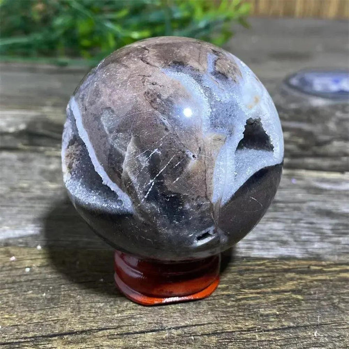 Polished Sphalerite Sphere with Stand. Metallic luster, amber, honey, and brown tones, grounding energy.
