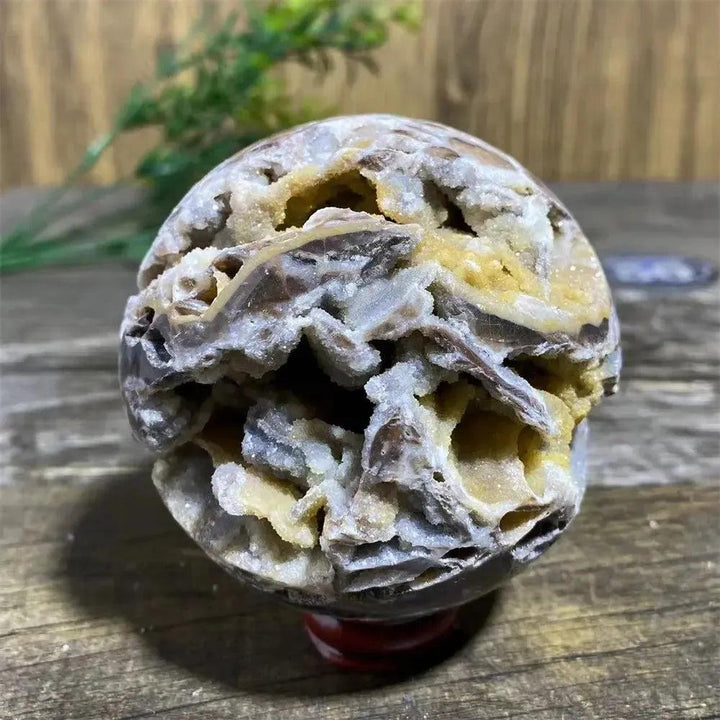 Sphalerite Sphere with Stand: Polished sphere with metallic luster, amber to brown tones, and unique resinous appearance.
