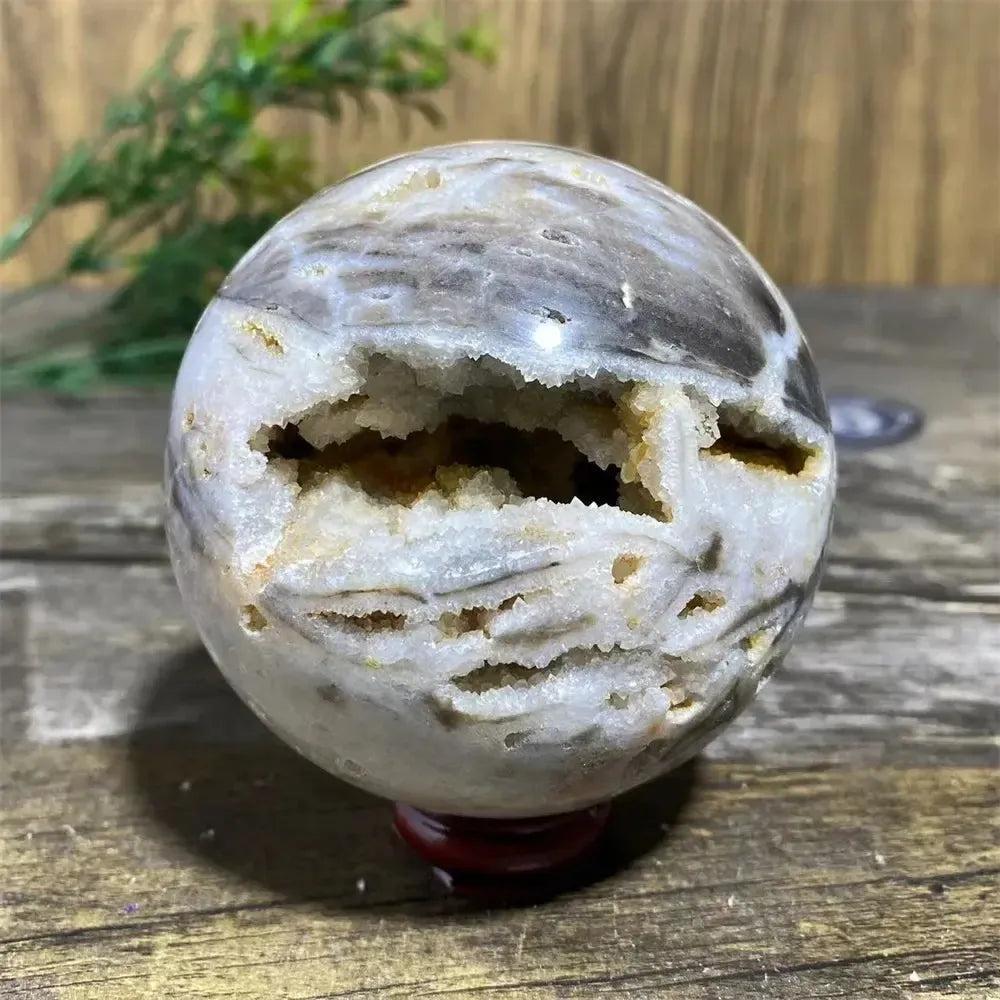 Polished Sphalerite Sphere with Stand. Unique metallic luster, rich amber to brown tones, and natural geode variations.