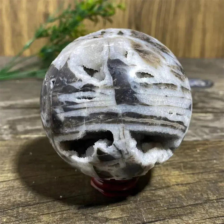 Polished Sphalerite Sphere with Stand: Unique metallic luster, rich amber to dark brown tones, and natural variations.