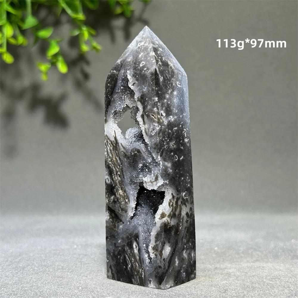 Polished 97mm sphalerite in quartz tower featuring dark grounding crystals for root chakra balance and energy.