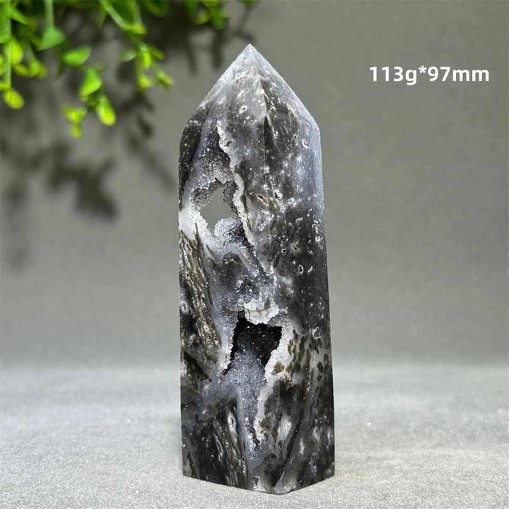 Polished 97mm sphalerite in quartz tower featuring dark grounding crystals for root chakra balance and energy.