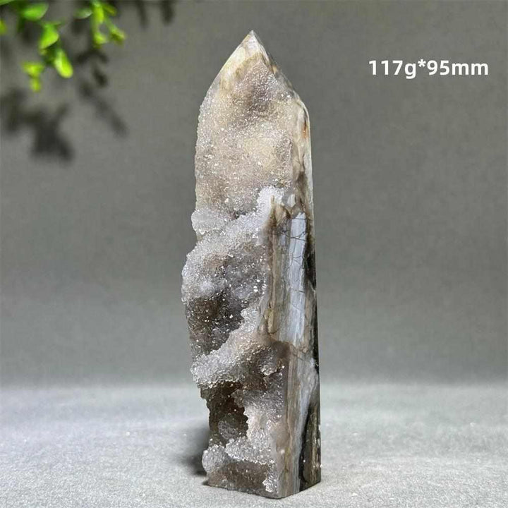 Polished 95mm Sphalerite in Quartz tower, featuring earthy brown crystals for grounding and clarity in a unique obelisk.