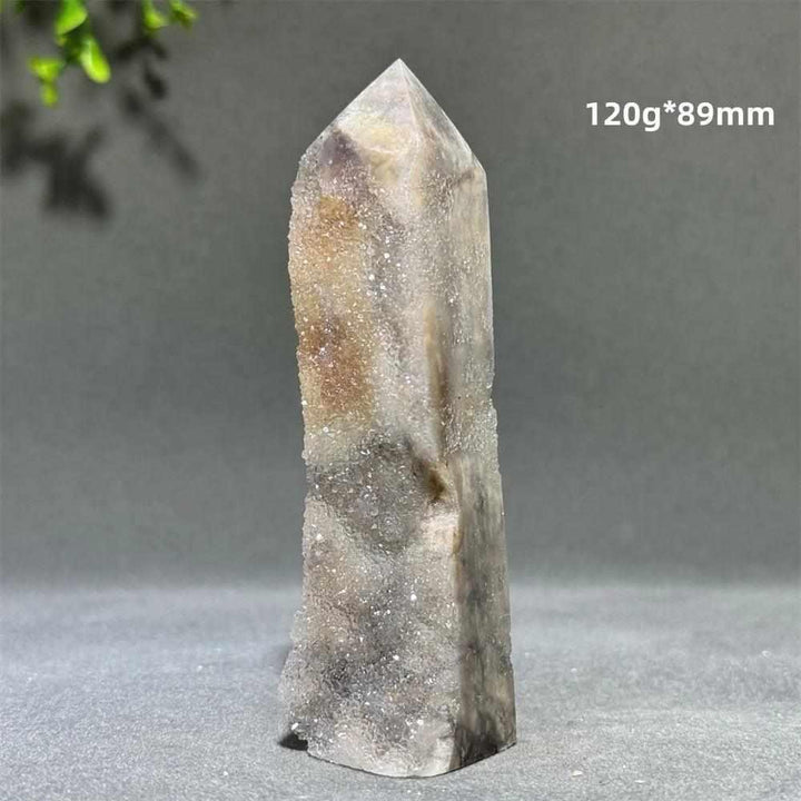 Polished sphalerite in quartz tower, 89mm tall, featuring earthy brown and black grounding crystals for clarity and balance.