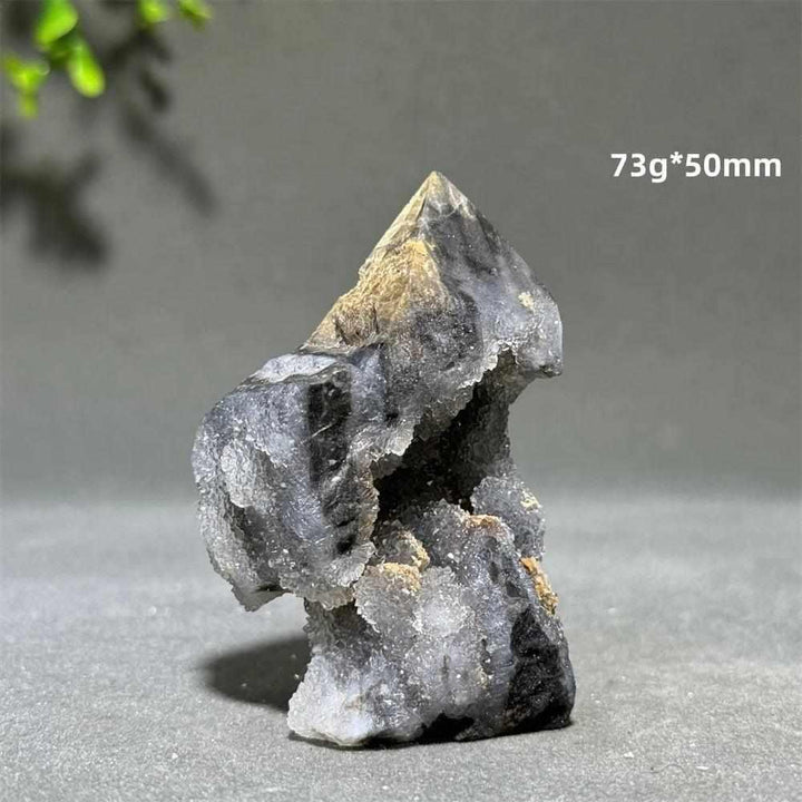 Polished Sphalerite in Quartz tower, a grounding 50mm crystal obelisk with earthy brown and black mineral inclusions.