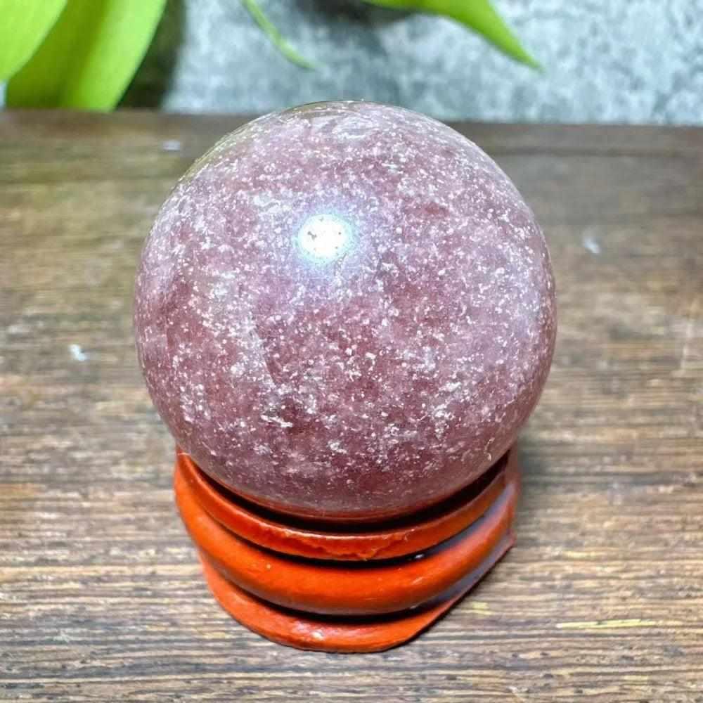 Polished 30-32mm Strawberry Quartz mini sphere with pink flecks and white snowflake clouds for Heart Chakra healing.