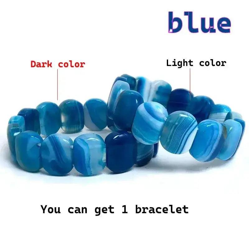 Blue Striped Agate Botswana Onyx Bracelet with polished, banded natural stones in light and dark blue hues.