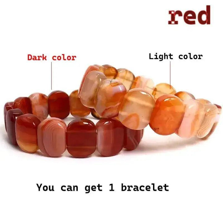 Striped Agate Botswana Onyx Bracelet with polished, banded natural stones in dark and light earthy red tones.
