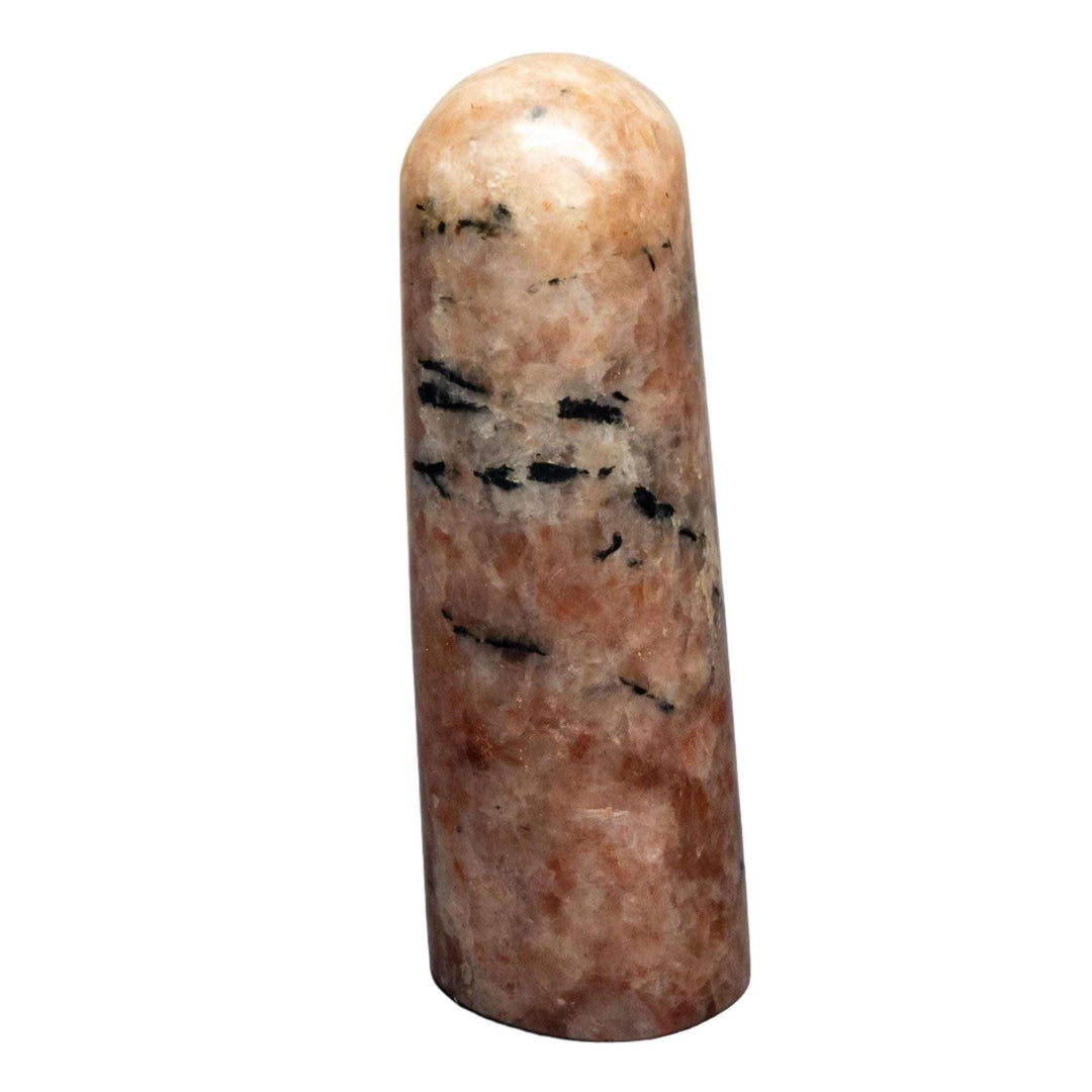 Warm golden-orange Sunstone with deep black Tourmaline striations in a radiant, protective freeform.