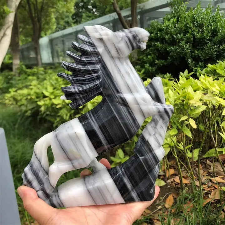 Hand-carved Taichi Quartz horse statue featuring striking black and white yin-yang patterns for grounding energy.
