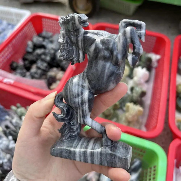 Hand-carved Taichi stone quartz horse sculpture with swirling black and white yin-yang patterns for grounding energy.