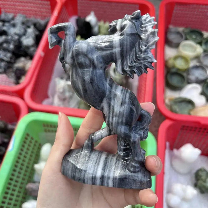 Hand-carved Taichi Stone Quartz horse sculpture featuring swirling black and white yin-yang patterns for grounding energy.
