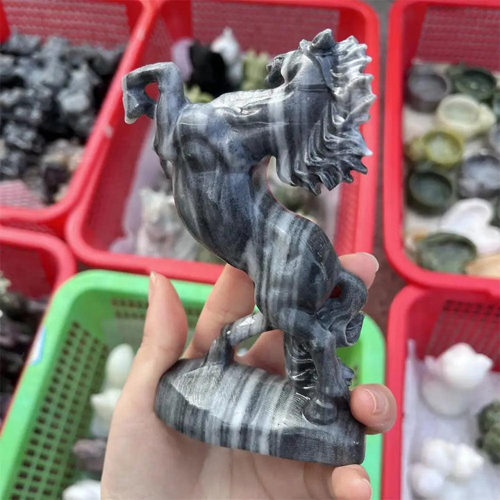 Hand-carved Taichi stone quartz horse sculpture with swirling black and white yin-yang patterns for grounding energy.
