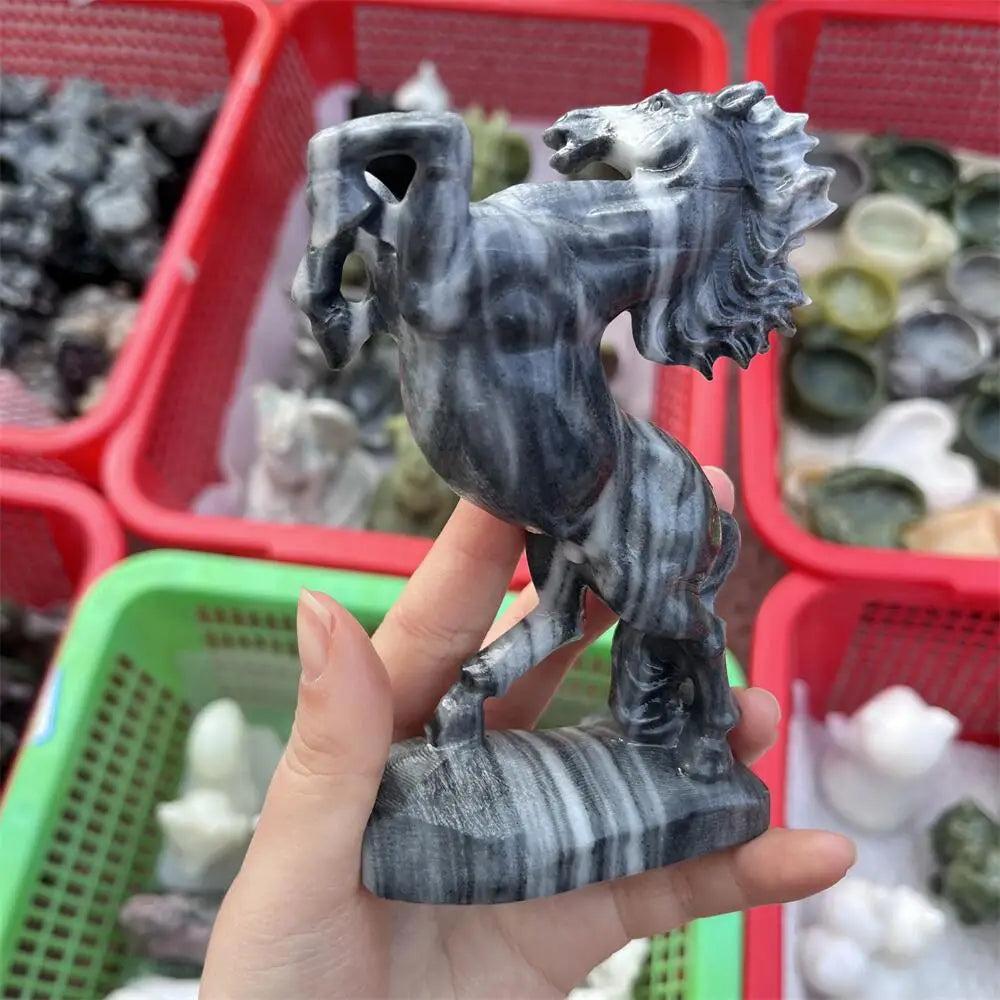 Hand-carved Taichi stone quartz horse sculpture featuring swirling black and white yin-yang patterns for grounding energy.