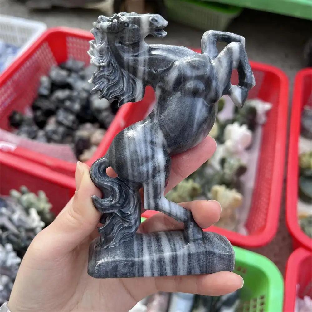 Hand-carved Taichi stone quartz horse sculpture featuring swirling black and white yin-yang patterns for grounding energy.
