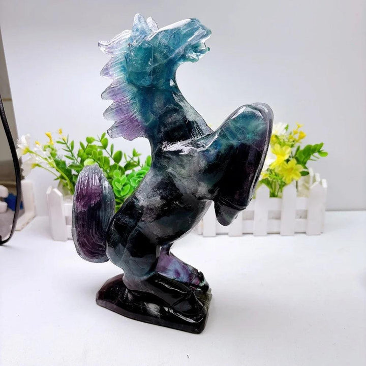 Tall fluorite crystal horse sculpture with polished green and purple banding for focus, clarity, and chakra balancing.