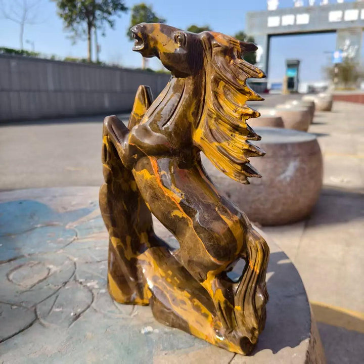 Polished Three-Flower Jasper flying horse statue with earthy, swirling patterns for grounding root chakra energy.
