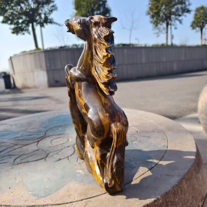 Polished Three-Flower Jasper flying horse statue with earthy, swirling patterns for grounding root chakra energy.