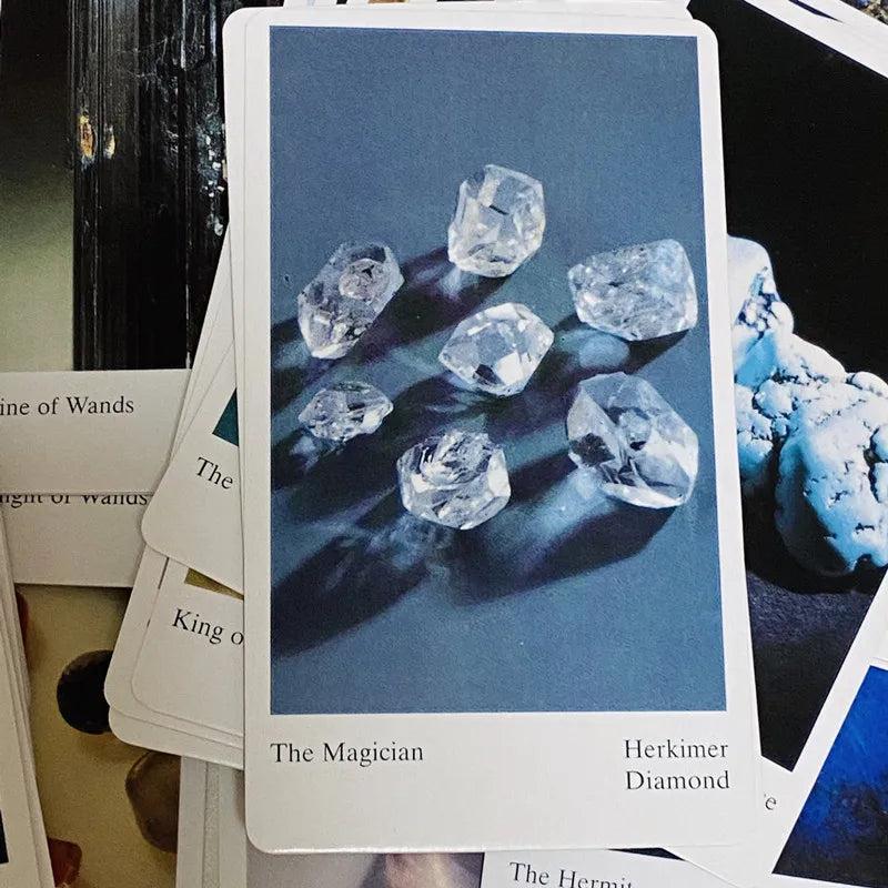 Tarot card "The Magician" featuring several clear Herkimer Diamonds on a deep blue background.