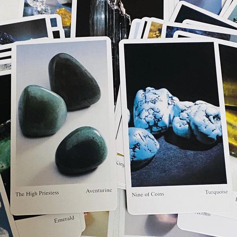 Two tarot cards from the Tarot of Gemstones and Crystals deck, featuring green aventurine and blue turquoise stones.
