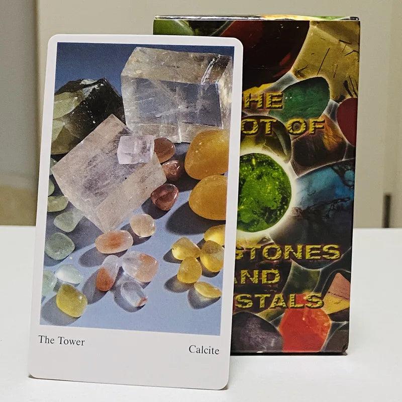 Tarot of Gemstones and Crystals "The Tower" card featuring clear and yellow calcite, with colorful deck box.