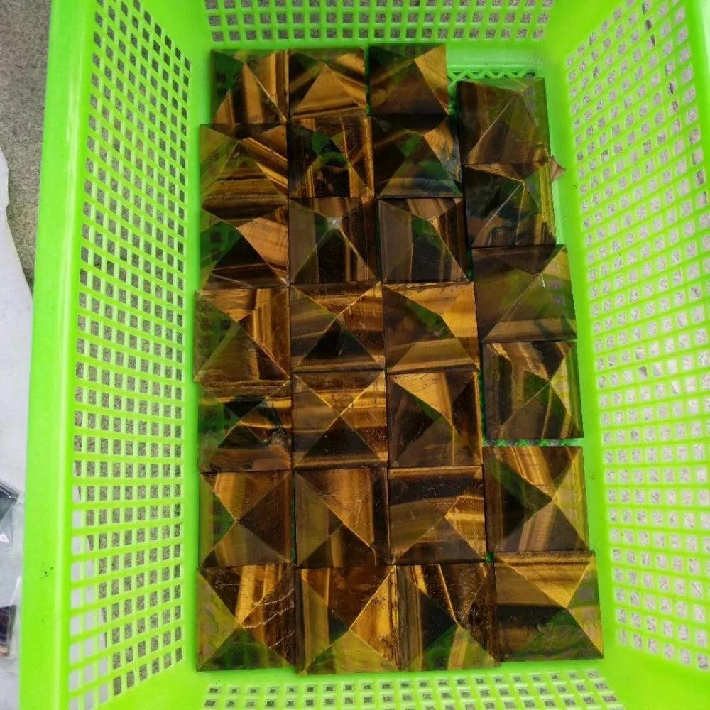 Tiger Eye Crystal Pyramids for Grounding and Confidence, showcasing warm, silky bands of gold and amber.