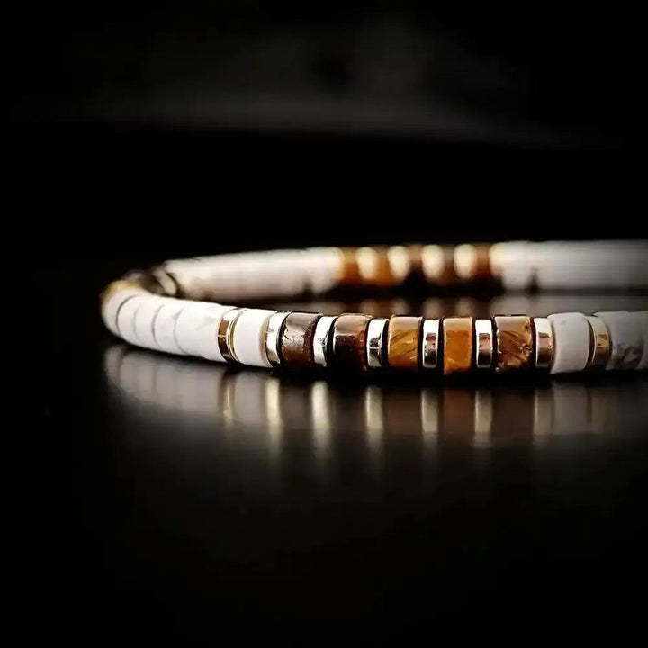 Tiger's Eye and White Stone disc bead bracelet with gold-tone spacers, promoting grounded confidence and style.