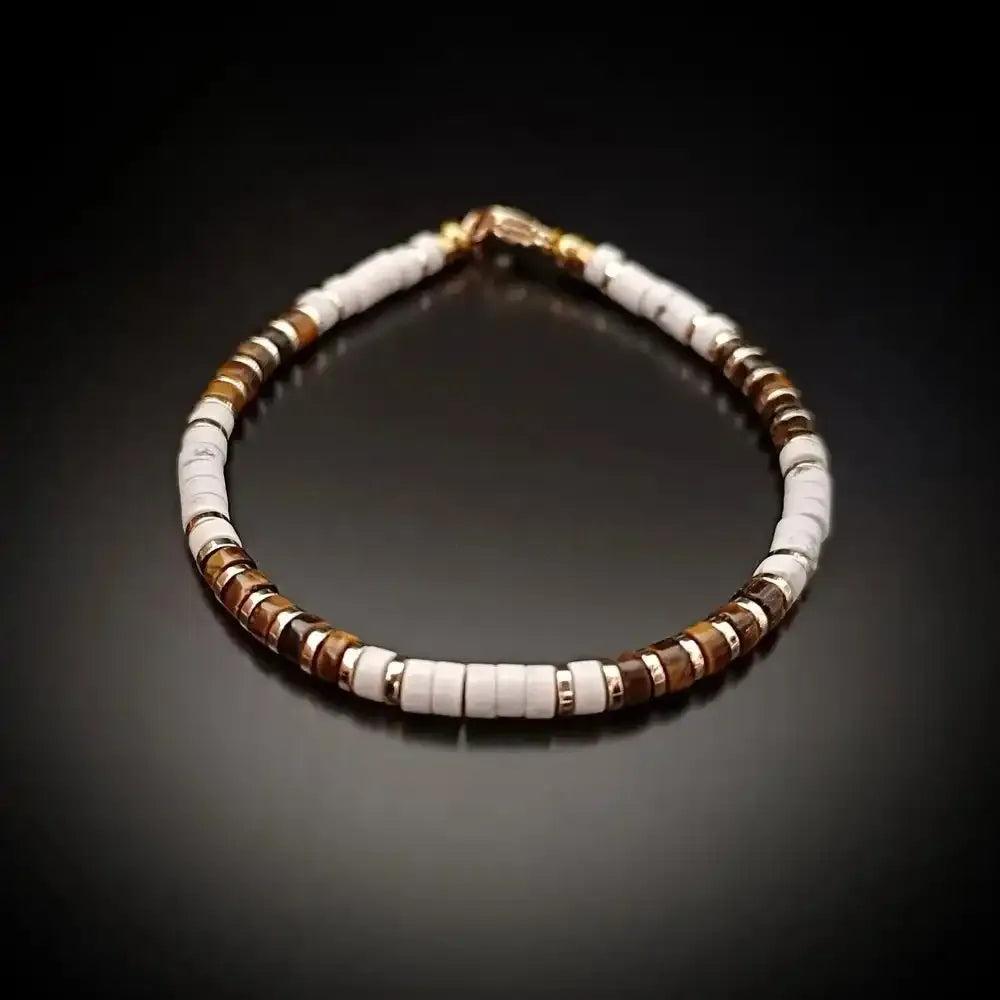 Tiger's Eye and white stone disc bead bracelet with gold-tone spacers for grounded confidence and elegant style.
