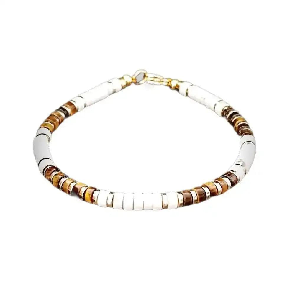 Tiger's Eye and white stone disc bead bracelet with gold-tone spacers for grounded confidence and elegant style.