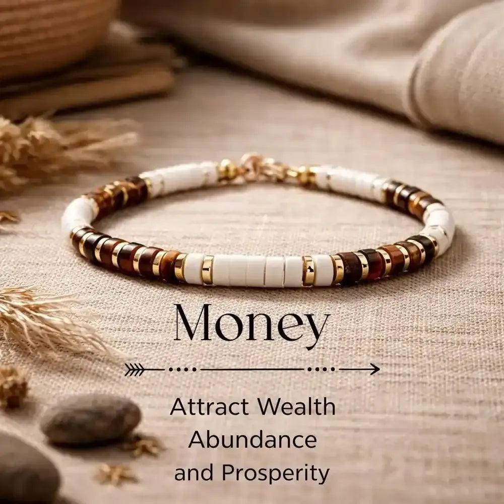 Tiger's Eye and white stone disc bead bracelet with gold-tone spacers, designed to inspire confidence and prosperity.