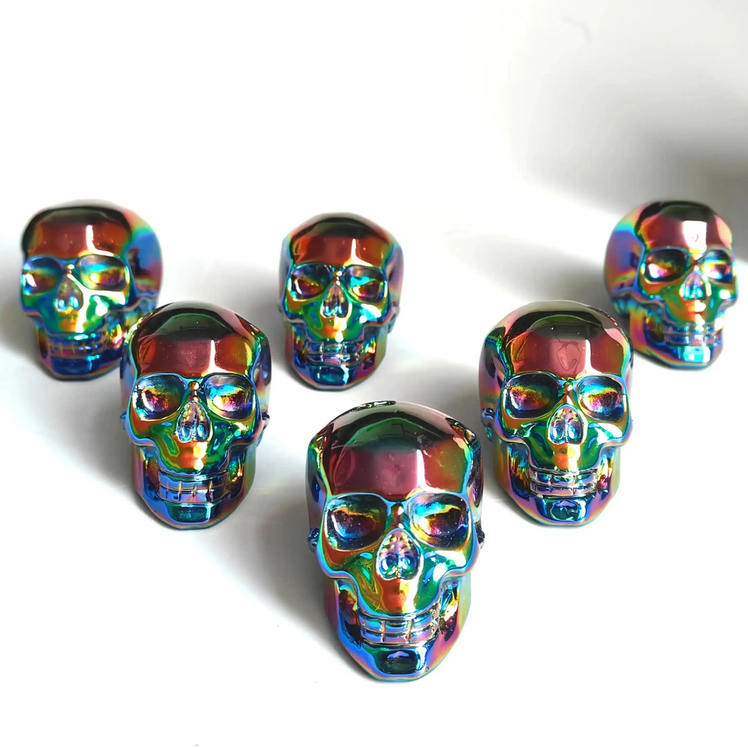 2.36'' Titanium Aura Obsidian skull carving featuring a vibrant, iridescent rainbow finish for powerful energy healing.