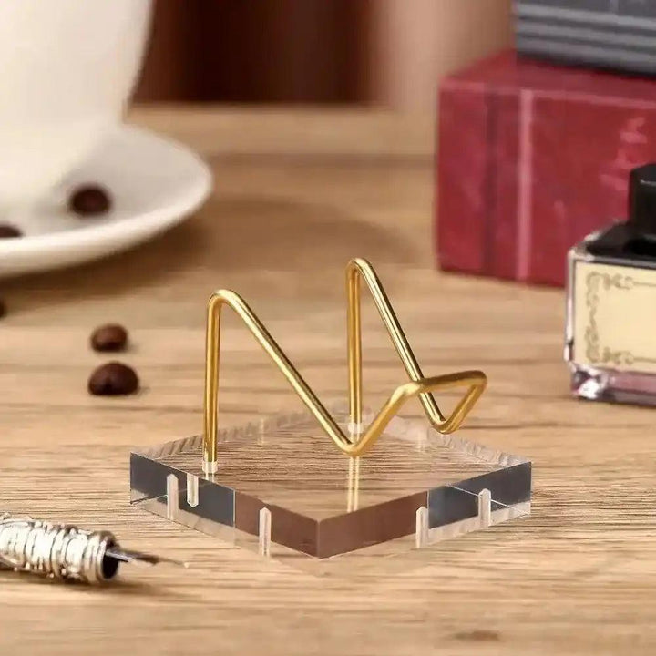 Transparent Acrylic Display Stand with gold wire holder, perfect for showcasing crystals and sacred objects.