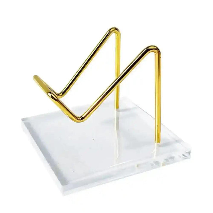 Elegant Transparent Acrylic Display Stand with golden wire holder, perfect for showcasing crystals and sacred objects.