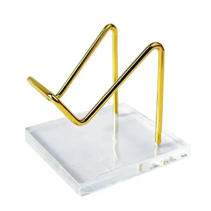 Elegant Transparent Acrylic Display Stand with gold-toned metal easel, perfect for showcasing crystals and sacred objects.