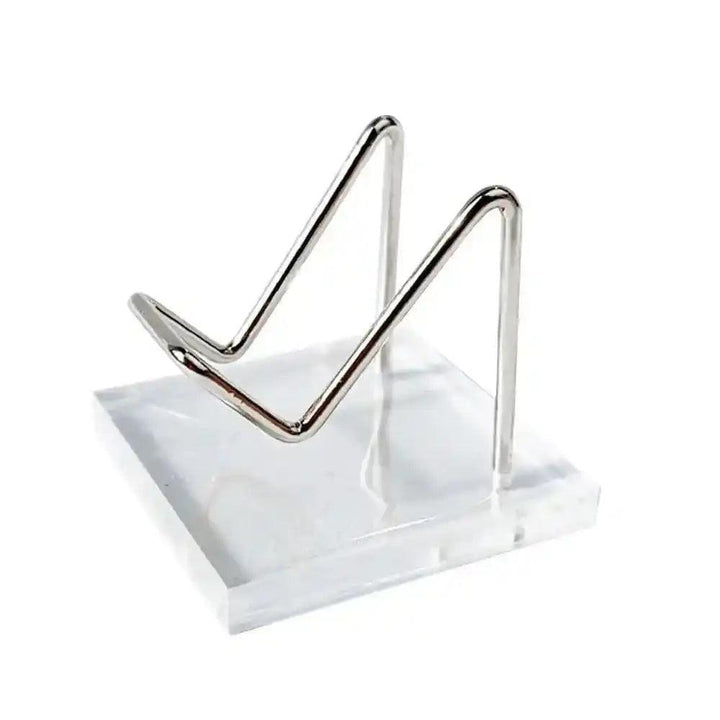 Transparent Acrylic Display Stand with silver metal easel, perfect for showcasing crystals and sacred objects.
