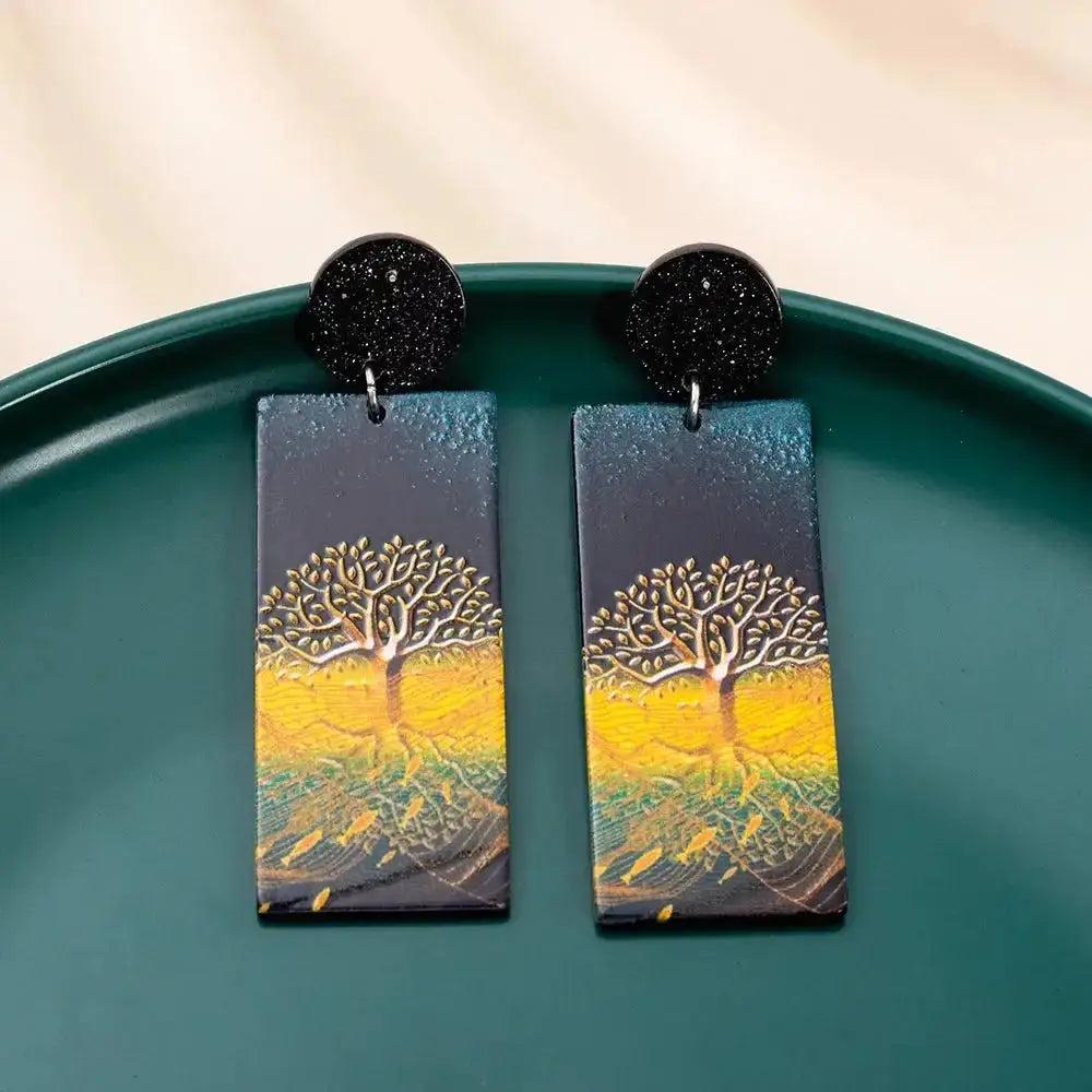New Style Tree of Life Acrylic Earrings with gold-colored relief printing, black glitter studs, and a vibrant design.