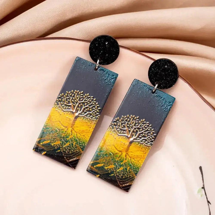 New Style Tree of Life Acrylic Earrings: Gold-colored Tree of Life design on rectangular acrylic, black glitter studs.