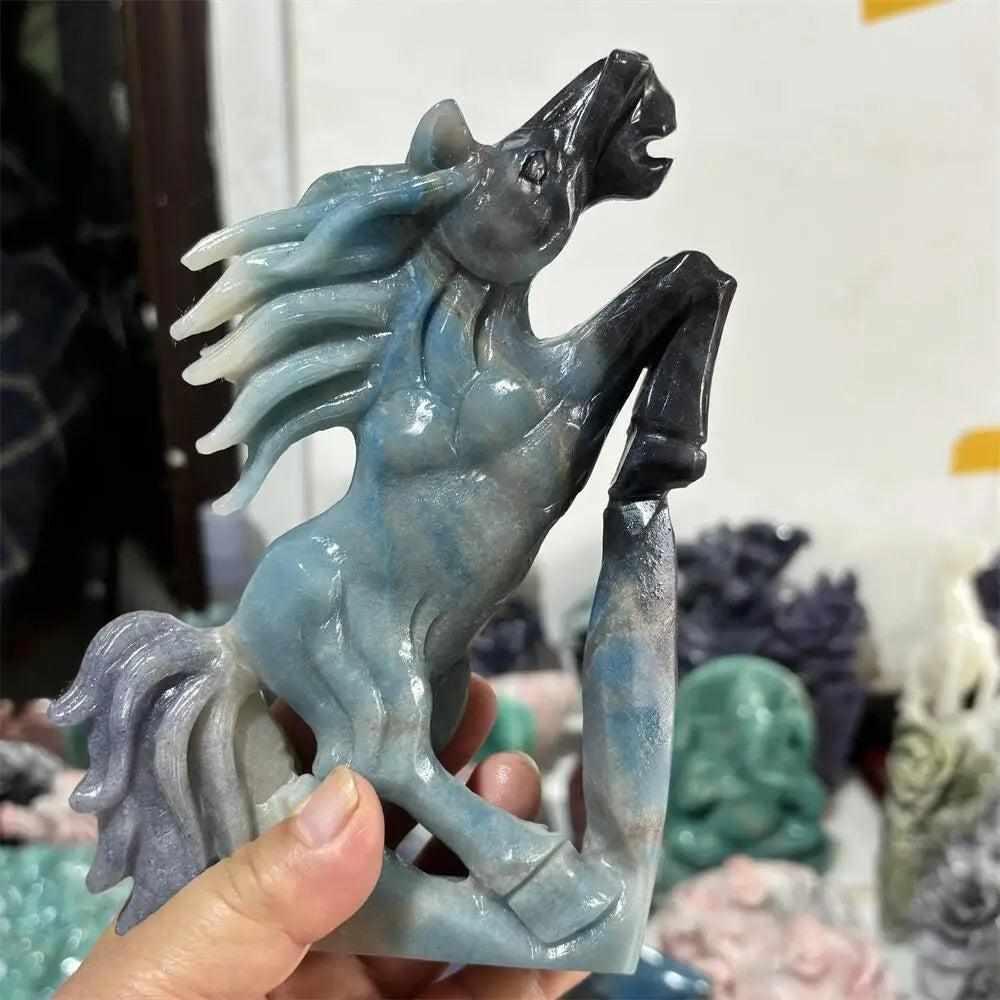 Hand-carved Trolleite crystal horse sculpture in blue-green, promoting Third Eye intuition and deep inner calm.
