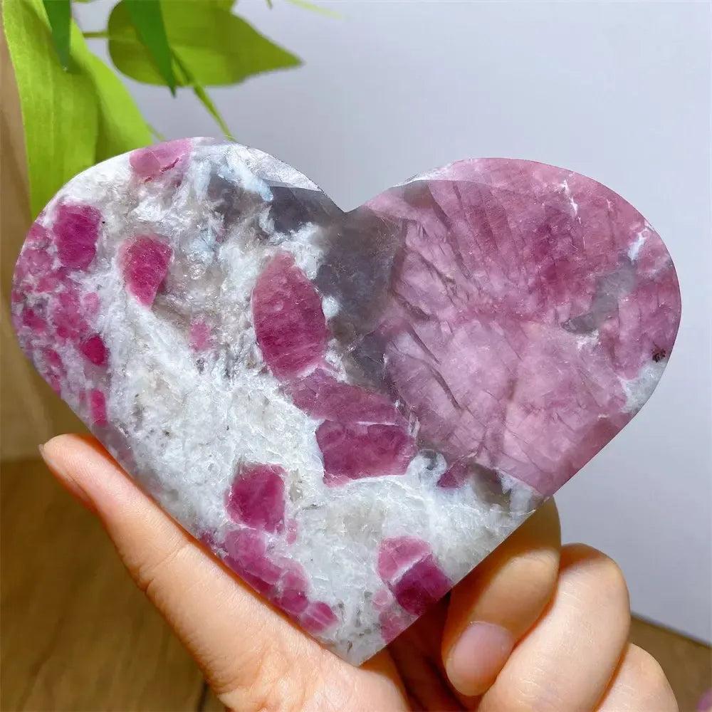 Hand-carved Unicorn Stone heart with swirling pink Tourmaline, smoky Quartz, and lavender Lepidolite.