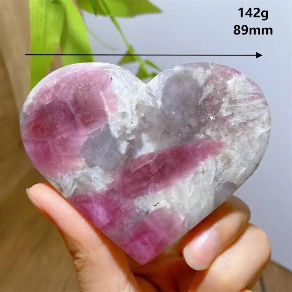 Hand-carved Unicorn Stone heart with swirling pink, grey, and purple patterns, weighing 142g and 89mm.