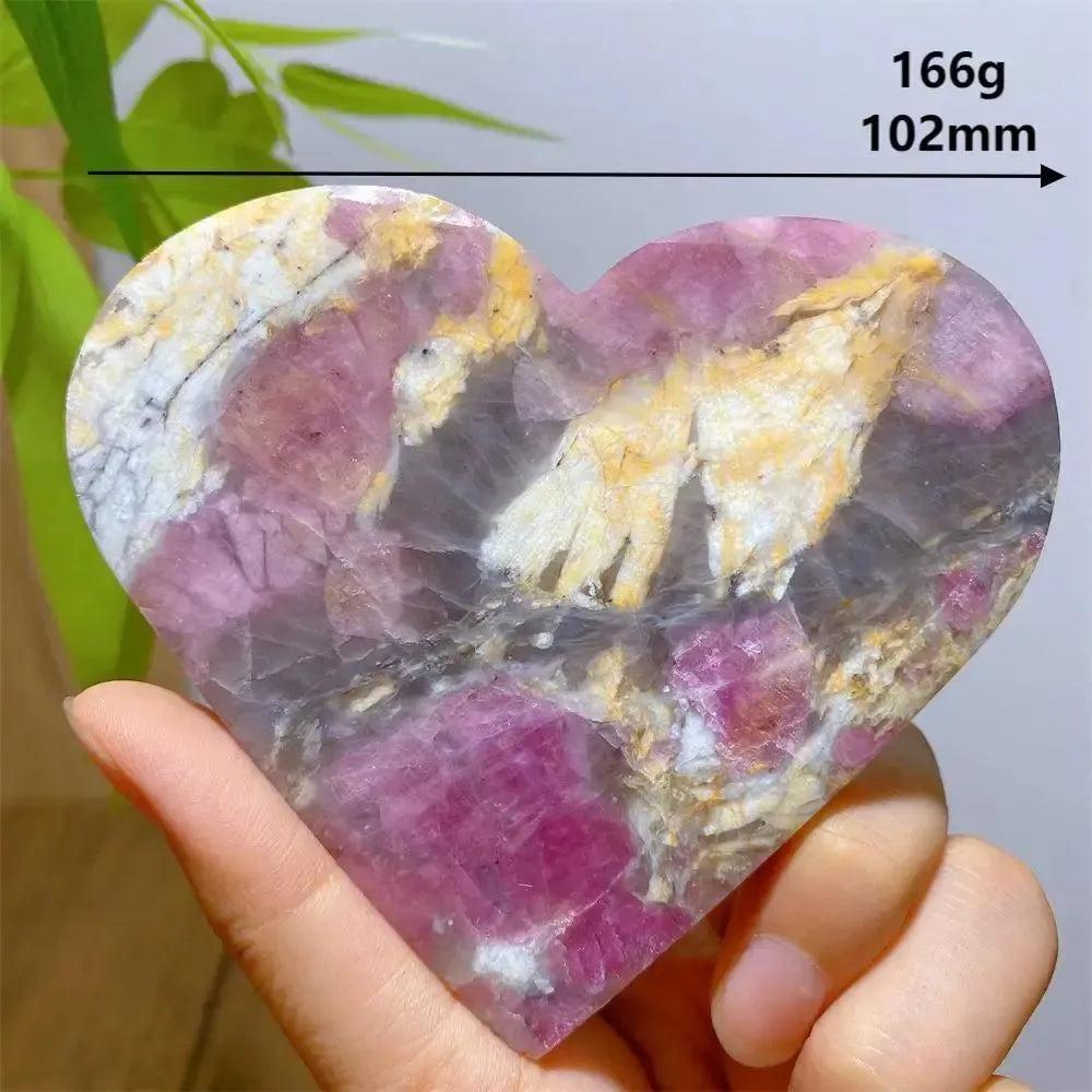 Unicorn Stone heart, 166g, 102mm, with swirling pink, grey, and purple hues.