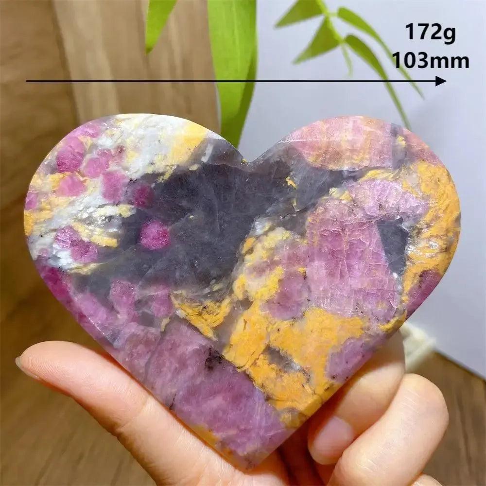 Unicorn Stone heart, 172g, 103mm, with swirling pink, grey, purple, and yellow natural patterns.