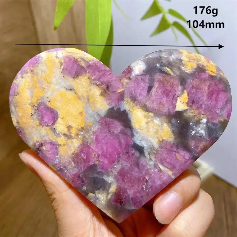 Unicorn Stone heart, 176g, 104mm, showcasing swirling pink, yellow, grey, and purple minerals.