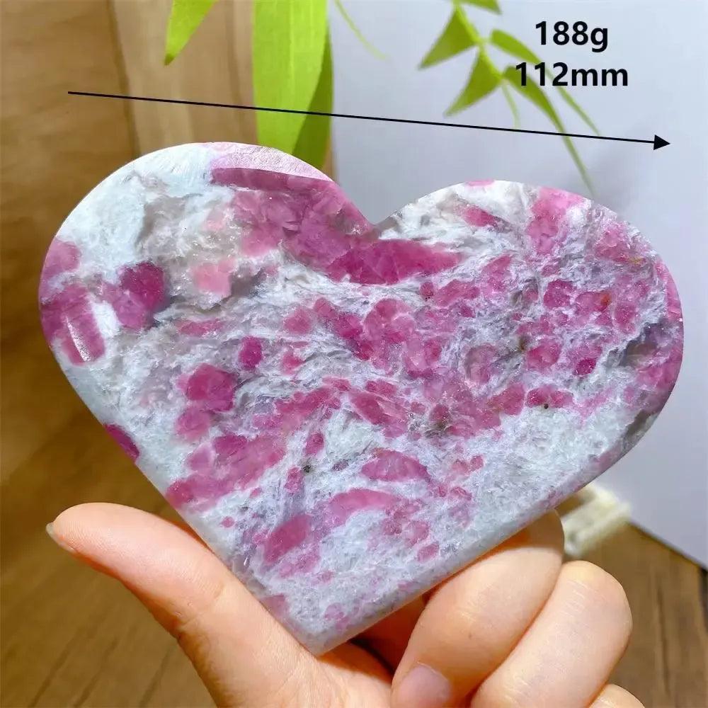 Polished Unicorn Stone heart with swirling pink Tourmaline, smoky Quartz, and lavender Lepidolite.