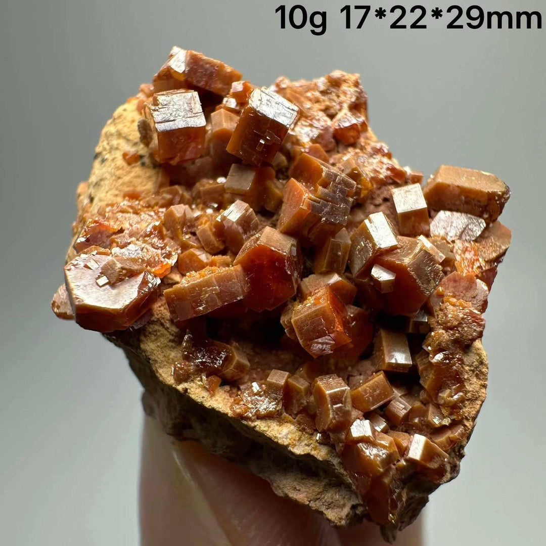 Vivid red hexagonal Vanadinite crystal specimen on natural matrix, perfect for Root and Sacral Chakra energy and display.