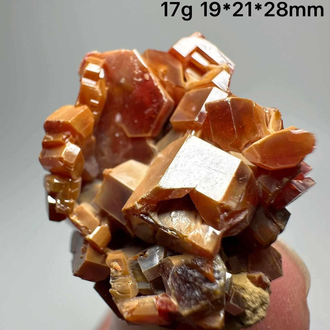 Vivid red hexagonal Vanadinite crystal specimen on matrix, perfect for Root Chakra energy and mineral display collections.
