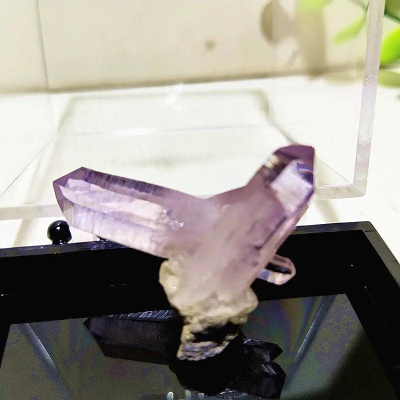 Raw Vera Cruz Amethyst cluster with pale lavender, transparent points for high-vibration spiritual healing and peace.
