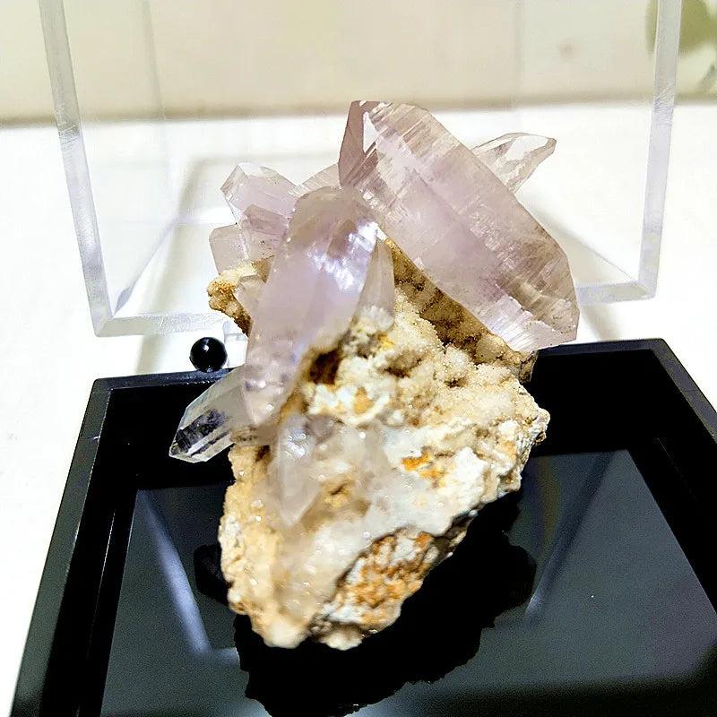 Raw Vera Cruz Amethyst cluster with pale, transparent lavender points for high-vibration spiritual healing and energy.