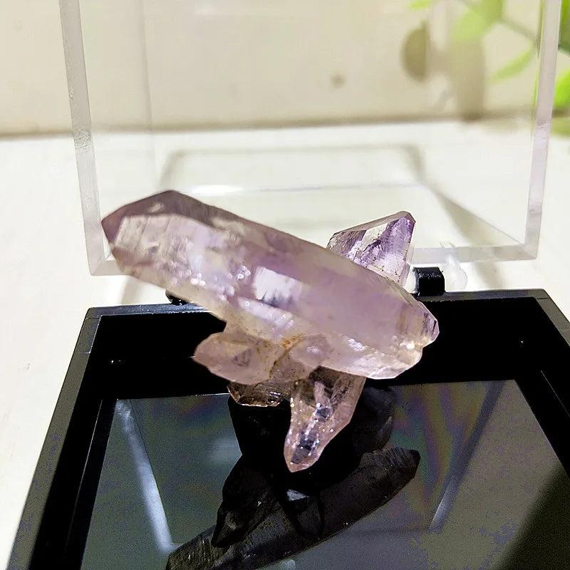 Raw Vera Cruz Amethyst cluster with transparent lavender points, perfect for high-vibration spiritual healing and meditation.