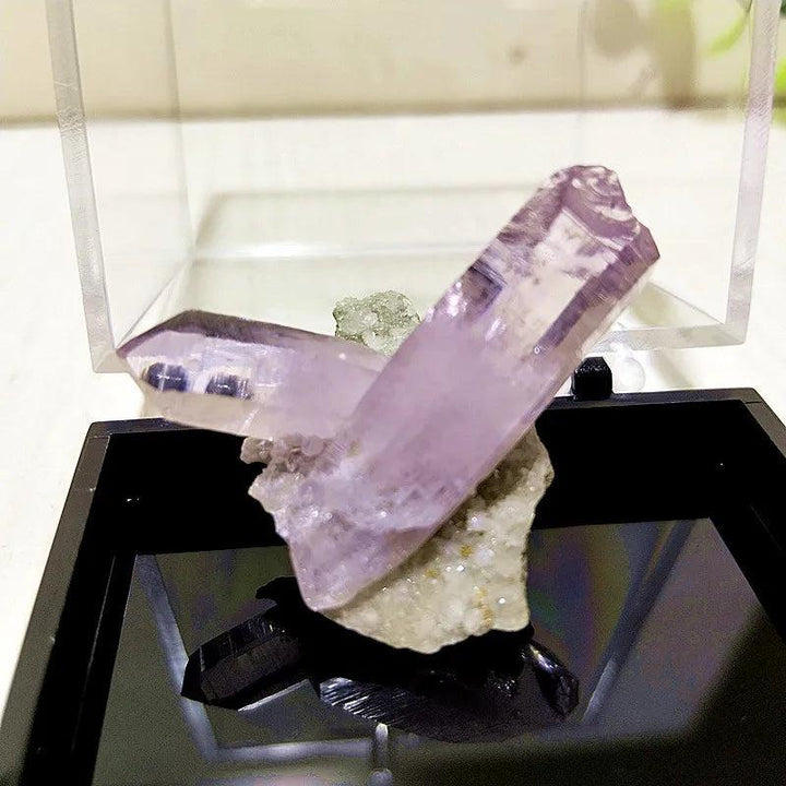 Raw Vera Cruz Amethyst cluster with pale lavender, transparent points for high-vibration spiritual healing.